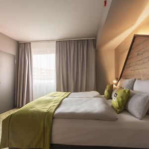 Kamer met Rolstoeltoegankelijkheid met een Queen Size Bed